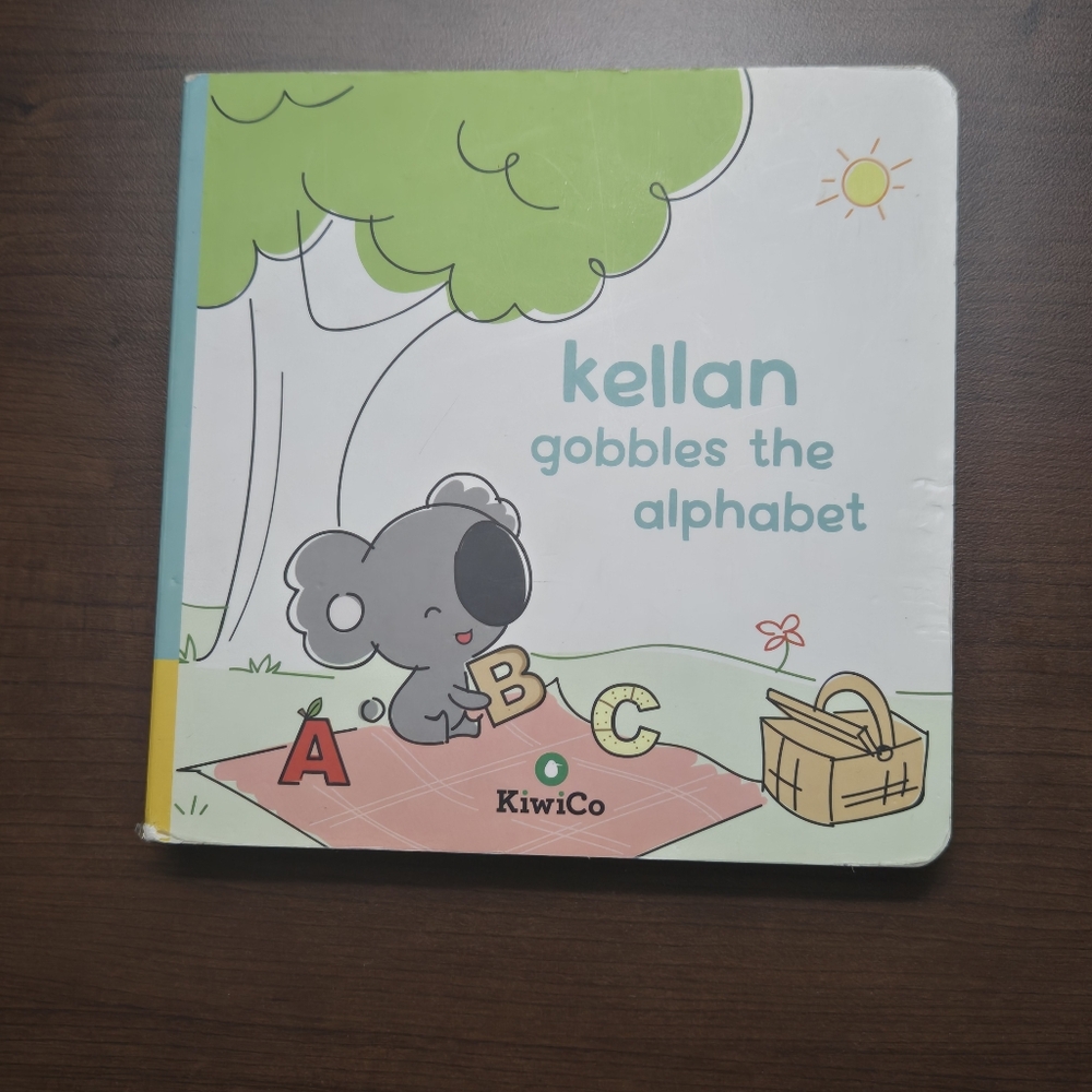 KiwiCo Board Book, Kellan Gobbles the Alphabet ABCs
